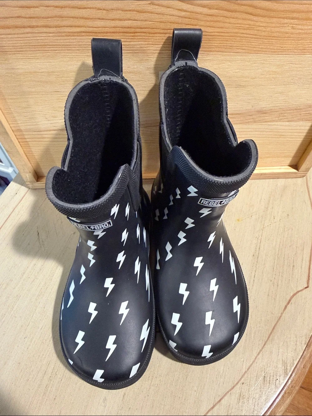 rebels Black Rain Boots with White Lightning Bolts